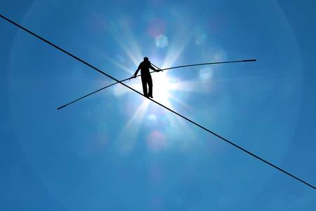 46326026-tightrope-walker-balancing-on-the-rope-concept-of-risk-taking-and-challenge